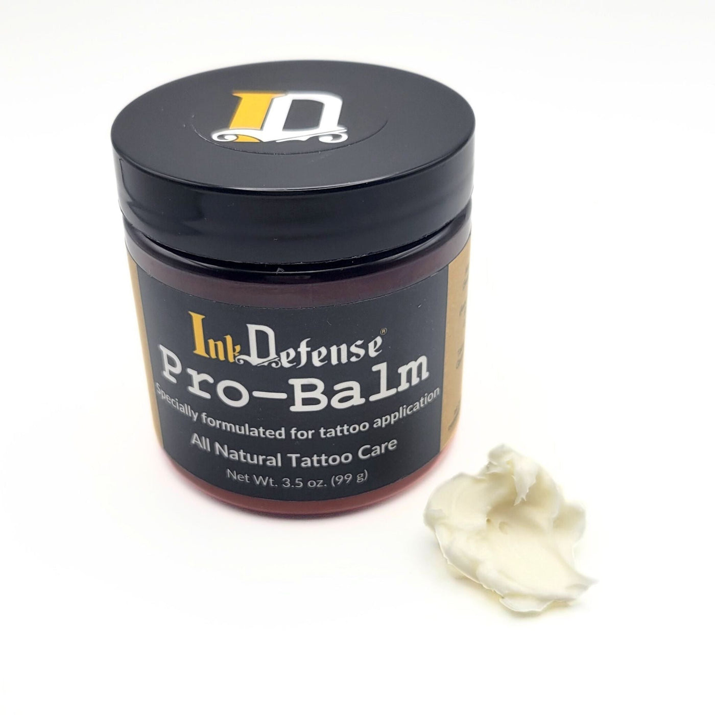 Pro-Balm for Tattoo Artists with product outside of container - Ink Defense