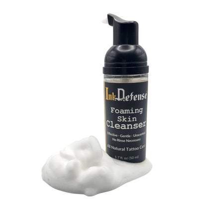 Foaming Cleanser for tattoo aftercare with product outside of bottle - Ink Defense